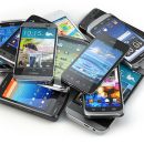 Choose mobile phone. Heap of the different smartphones. 3d